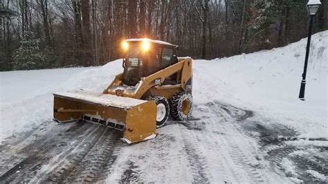 plowing snow with a track skid steer|used skid steer snow plow.